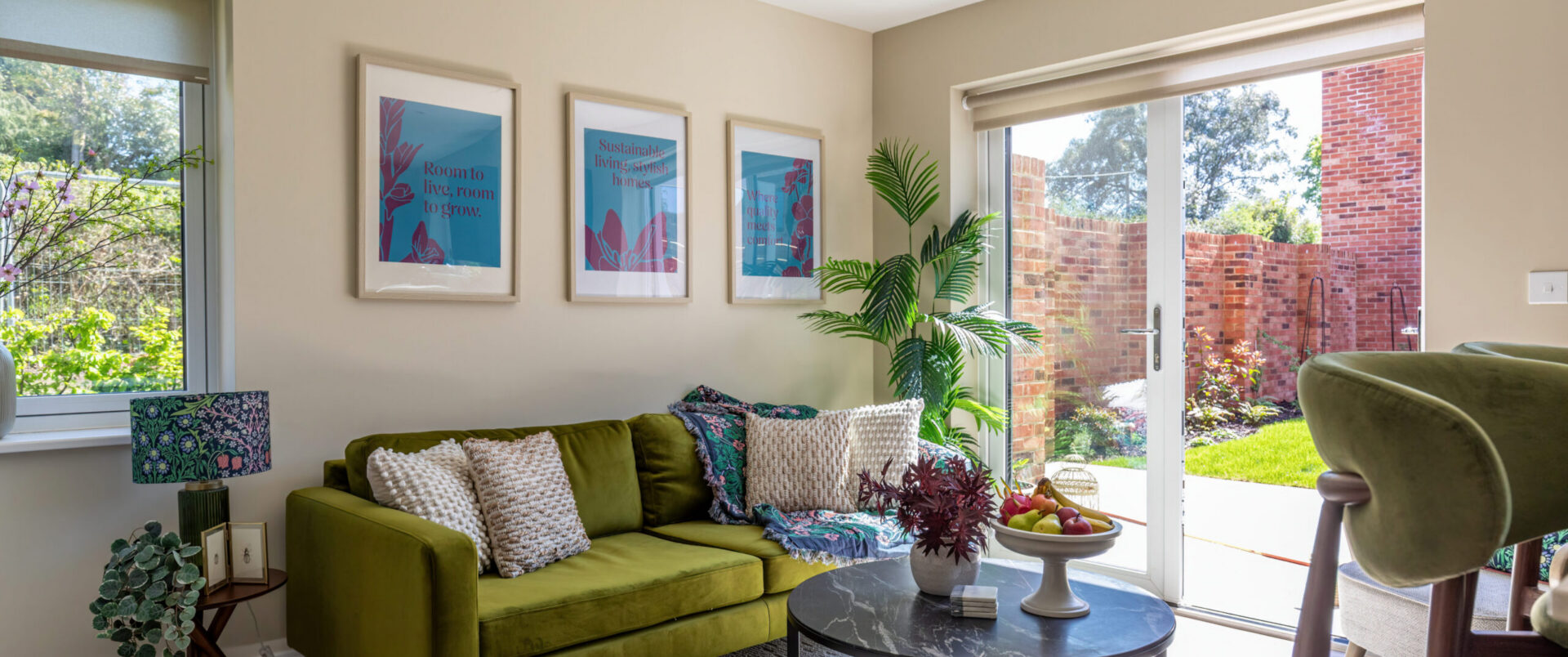 A reception room leading out into a garden of a show home
